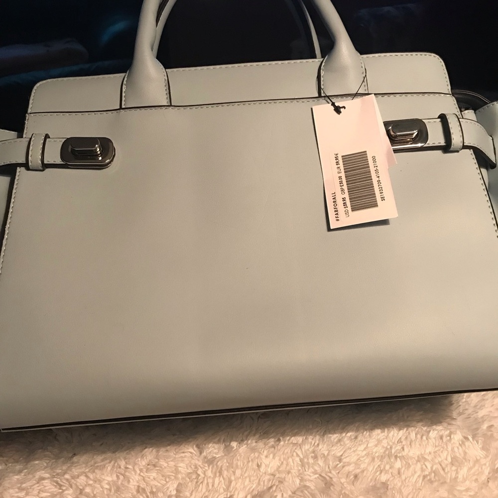 Purse.Shoulder strap and handles. Dusty blue.
